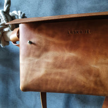 Load image into Gallery viewer, vegetable tanned leather, vegetable tanned leather handbag, cognac leather, leather cross bag, leather hip bag, cognac leather bag, leather craft, leather handmade bag, laska je, leather embossing, personal leather embossing