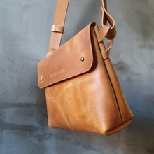 Load image into Gallery viewer, vegetable tanned leather, vegetable tanned leather handbag, cognac leather, leather cross bag, leather hip bag, cognac leather bag, leather craft, leather handmade bag,